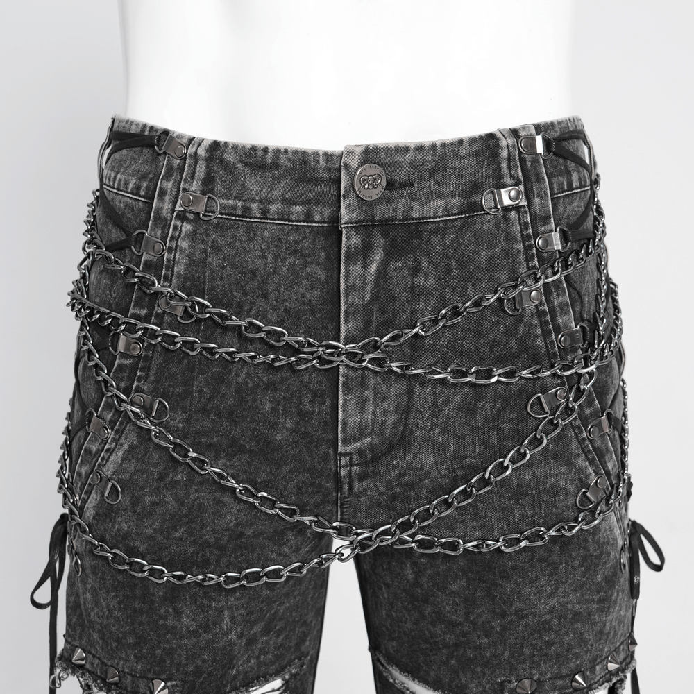 Gothic ripped denim pants with chains and stud details, showcasing a bold rebellious style.