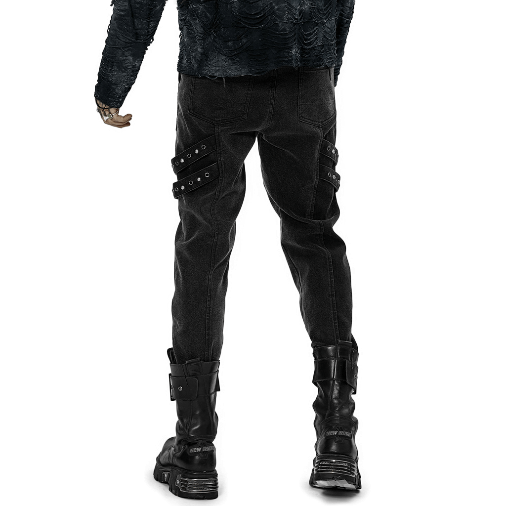 Back view of rugged denim cargo pants with edgy knee patches and decorative loops, perfect for a post-apocalyptic look.