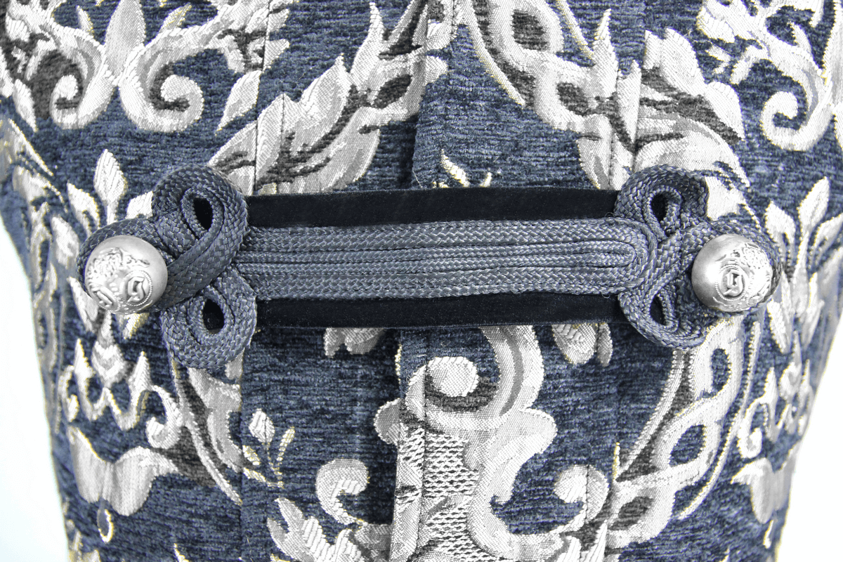 Close-up of silver embroidery and button detail on men's gothic long coat, showcasing elegant vintage design.