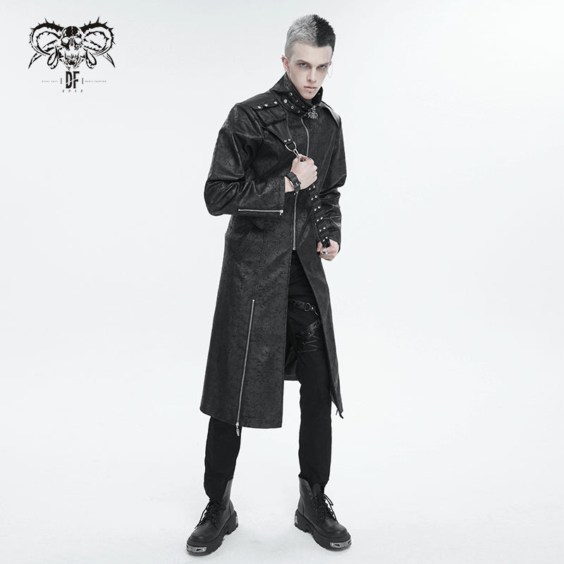 Stylish male model in a black stand collar split coat with an edgy design and detachable strap, embodying alternative elegance.