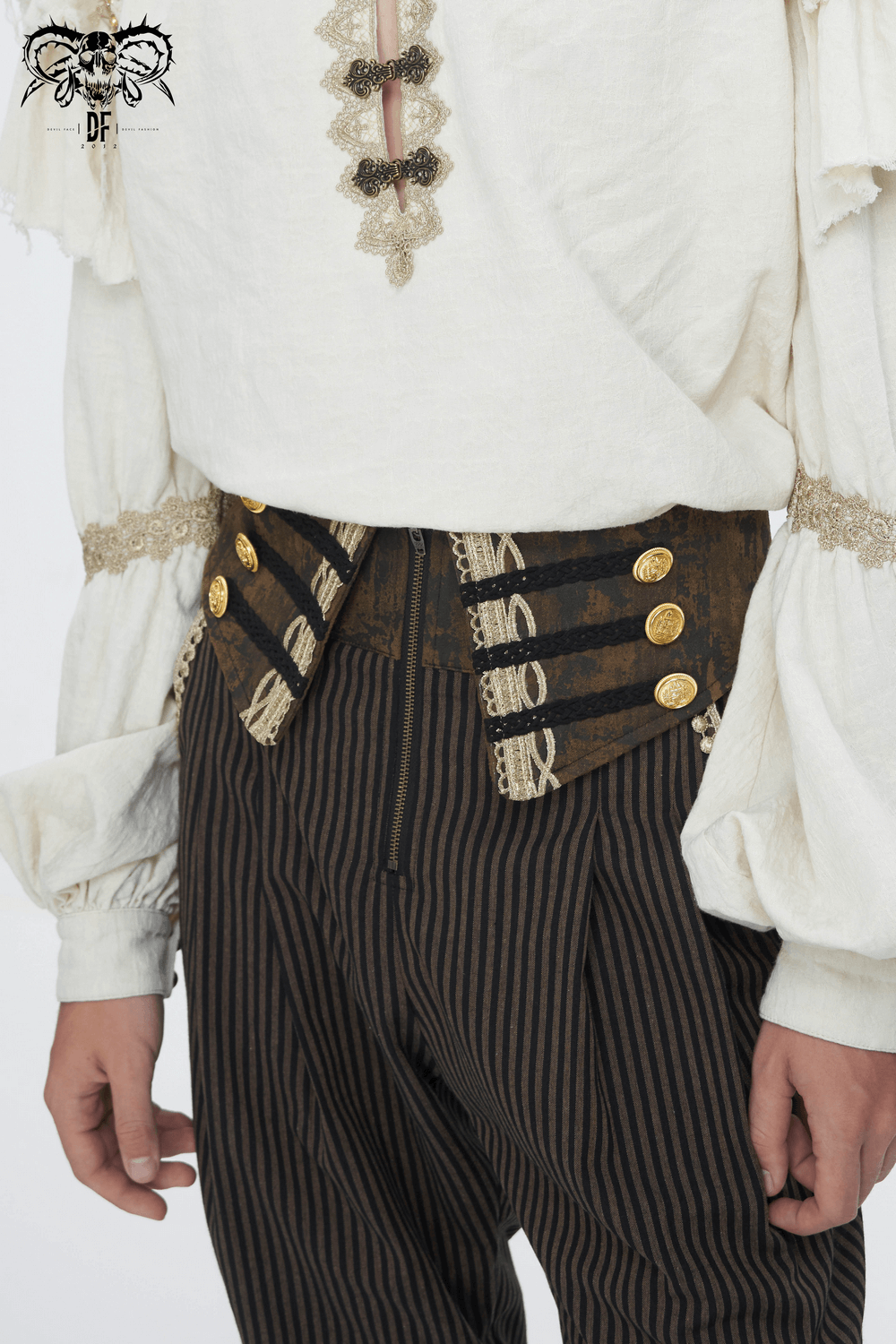 Close-up of male model wearing high-waist striped trousers with button accents and white shirt.
