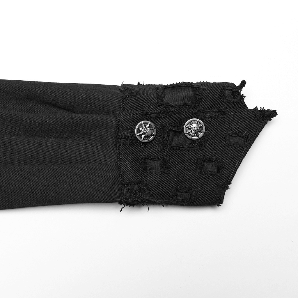 Close-up of male gothic shirt cuff showcasing stud detailing and metal skull buttons for a punk rock look.