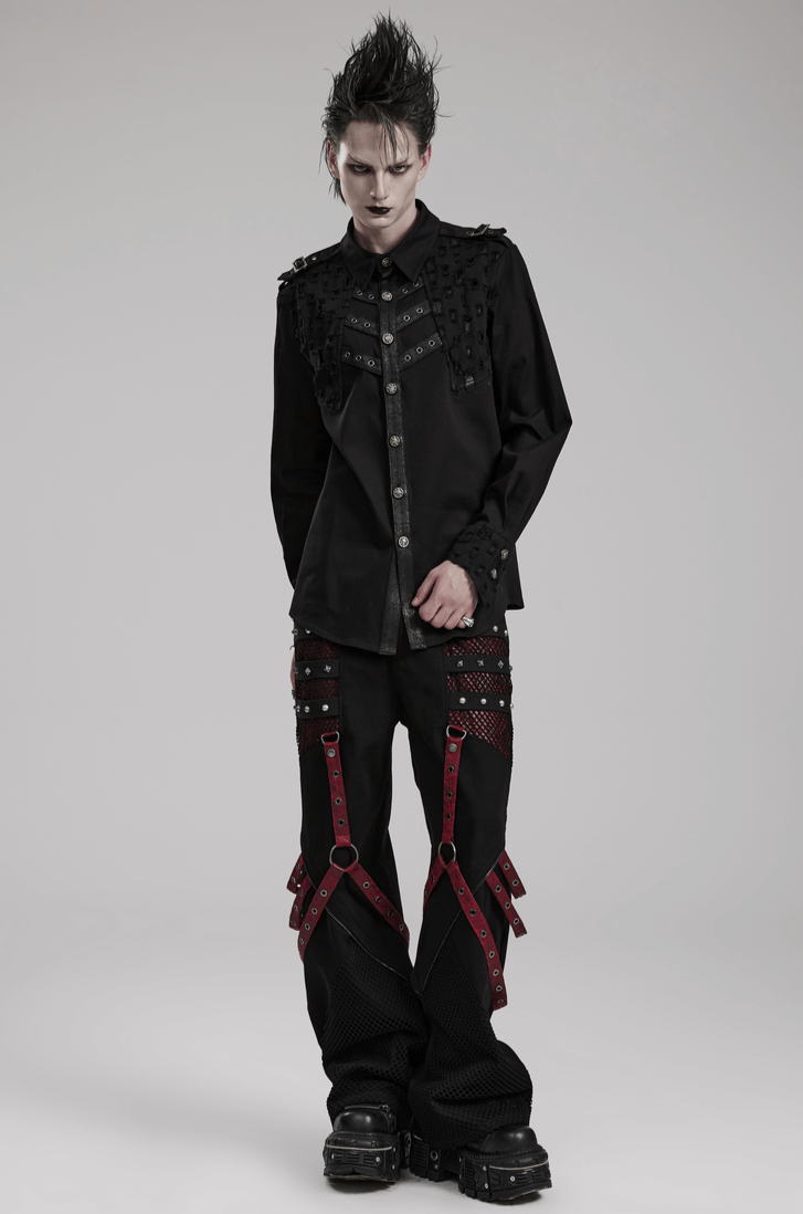 Male model in a punk gothic shirt with studded detailing and striking metal accents, showcasing edgy fashion style.