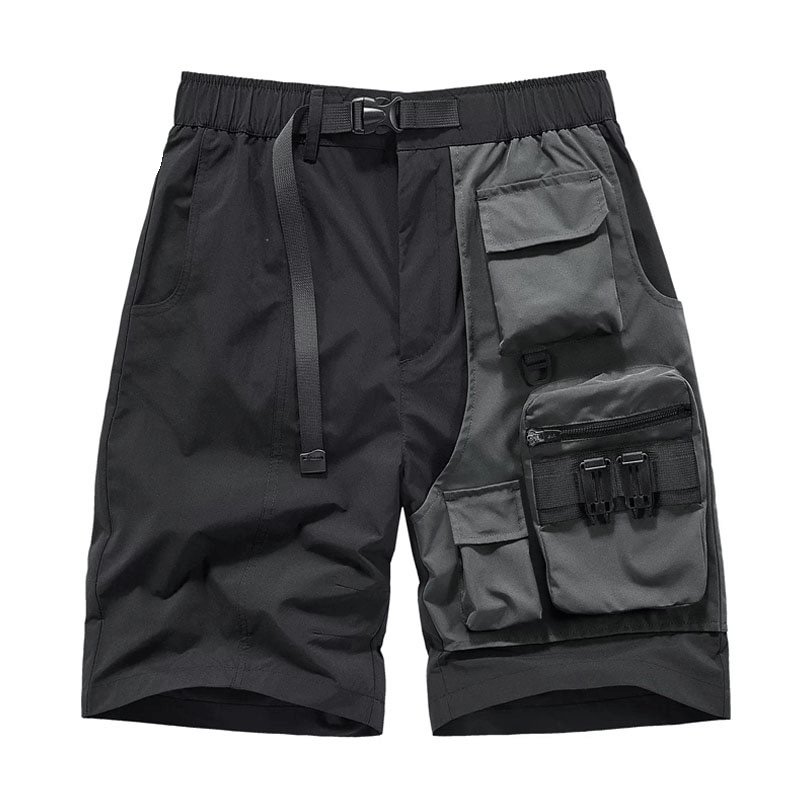 Men's tactical multi-pocket shorts in black, featuring patchwork design and adjustable waistband for urban style.