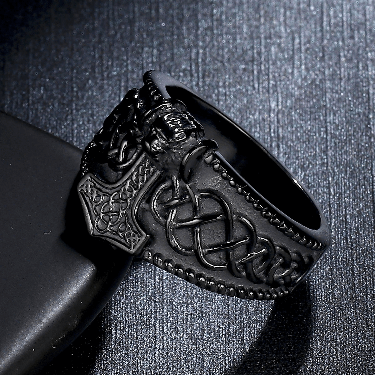 Men's vintage Thor's Hammer Celtic ring in black stainless steel, featuring intricate punk designs and a unique braided pattern.