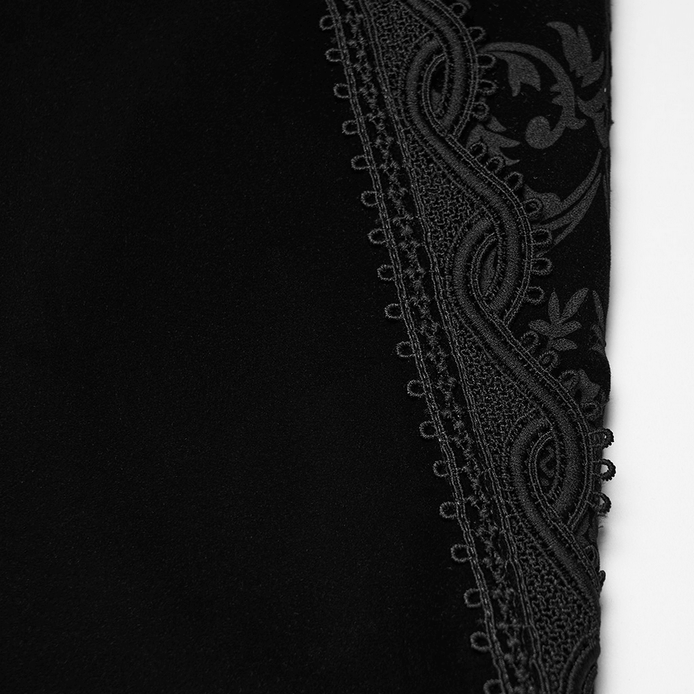 Close-up of Male Velvet Pants with Lace and Gemstone Buttons showcasing elegant lace detail.