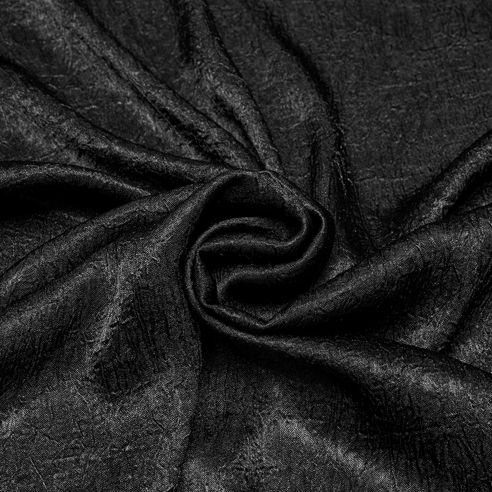 Elegant black textured fabric, perfect for gothic clothing designs and vintage fashion.