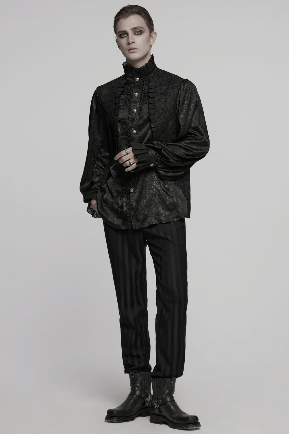 Elegant male Victorian black shirt with lace, ruffled cuffs, and engraved buttons, exuding gothic sophistication.