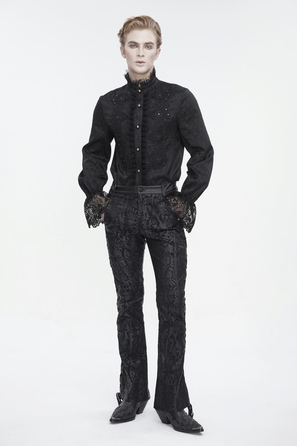 Male model showcasing vintage Gothic lace-up flared pants with intricate details and elegant black attire.