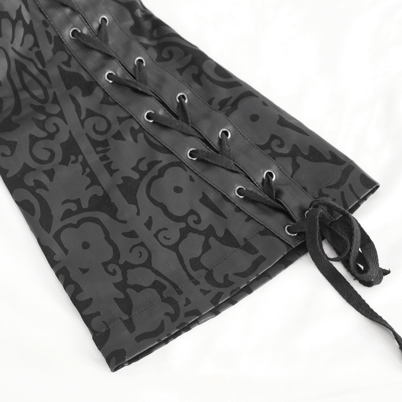 Close-up of gothic-style vintage lace-up flared pants, featuring intricate black patterns and stylish lace detailing.