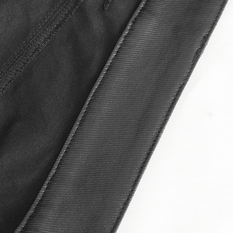 Close-up detail of the fabric and stitching of gothic style male vintage lace-up flared pants.