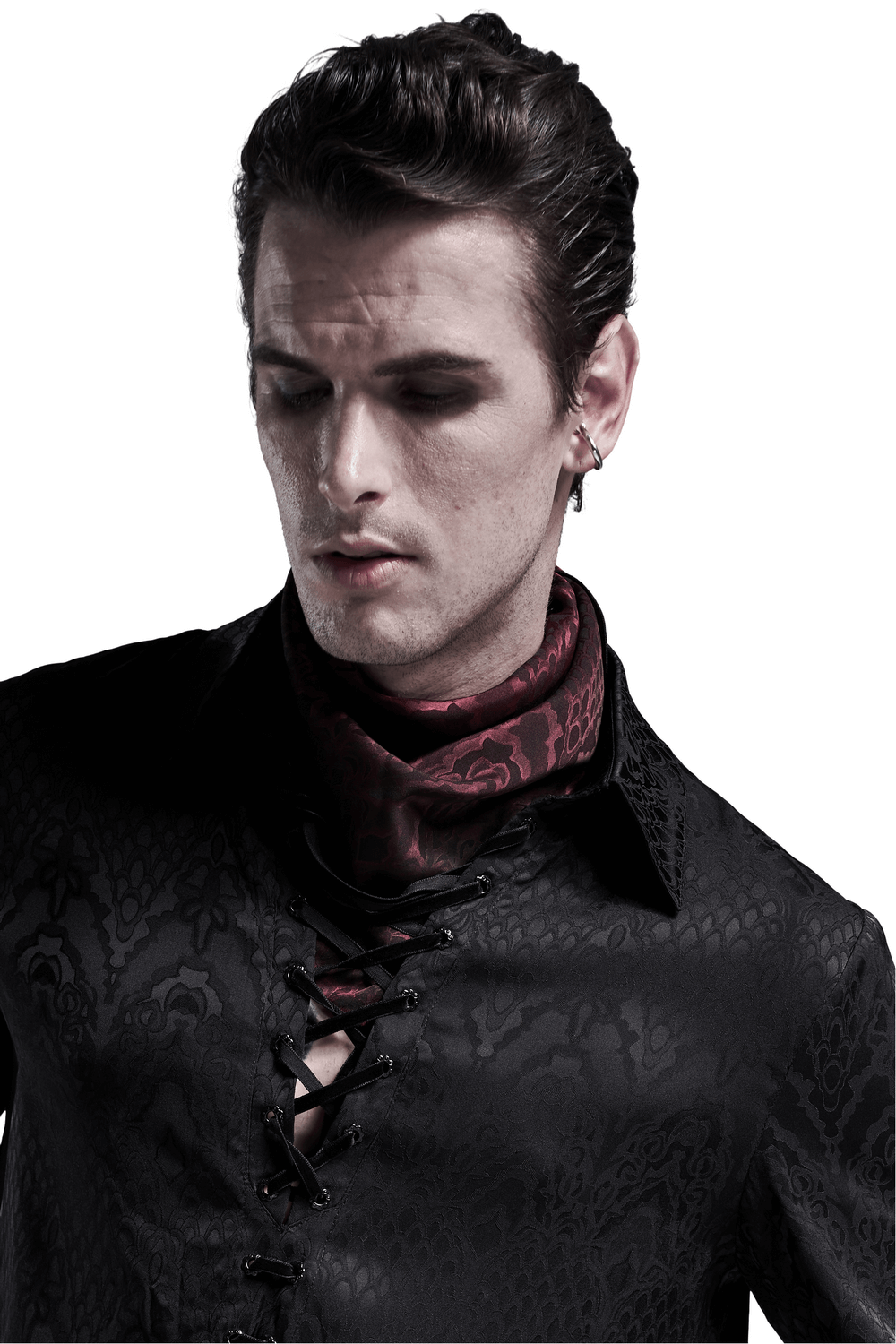 Stylish man wearing a wine-red gothic jacquard triangular bandana with a dramatic black shirt.