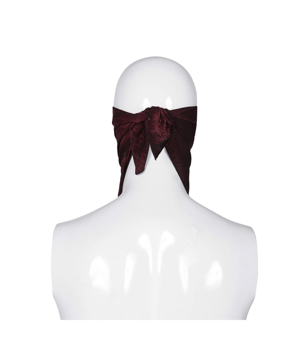 Back view of a male model wearing a wine red gothic jacquard triangular bandana with a bow tie.