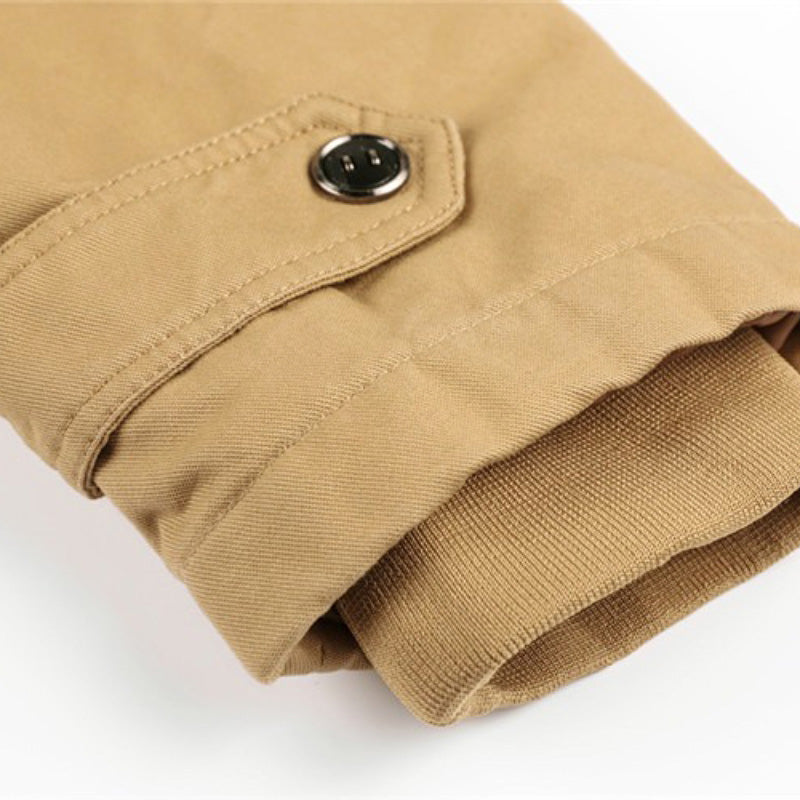 Close-up of the sleeve of a men's warm hooded coat in khaki, showcasing button detail and soft thermal lining.
