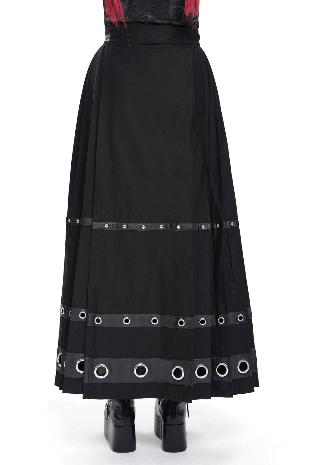Elegant black maxi skirt featuring pentagram straps and eye-catching grommet details, perfect for a bold, stylish look.