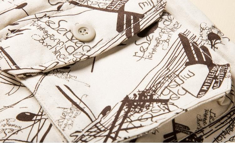 Close-up of men's cargo cotton shorts showcasing unique print and button detail for stylish alternative fashion.