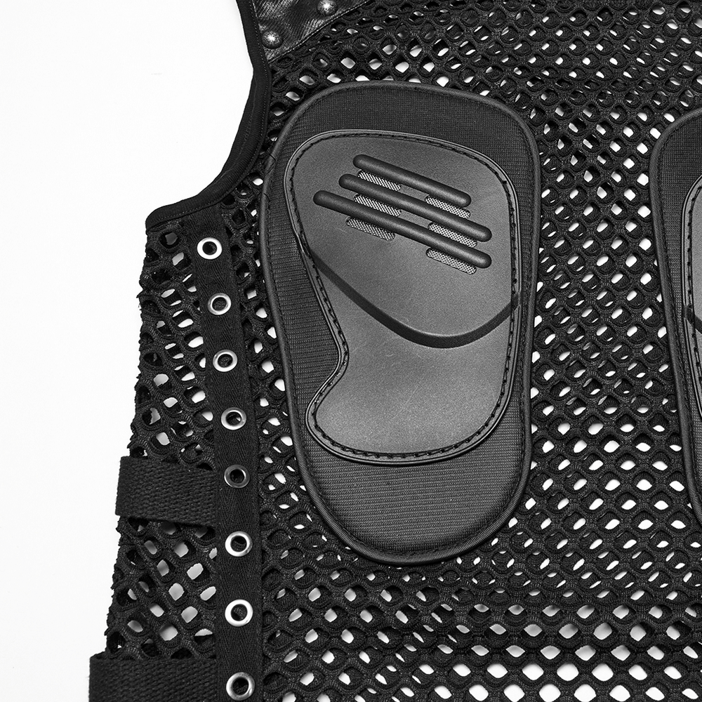 Close-up of men's cyber punk mesh vest featuring faux leather patches and studded eyelet detailing.