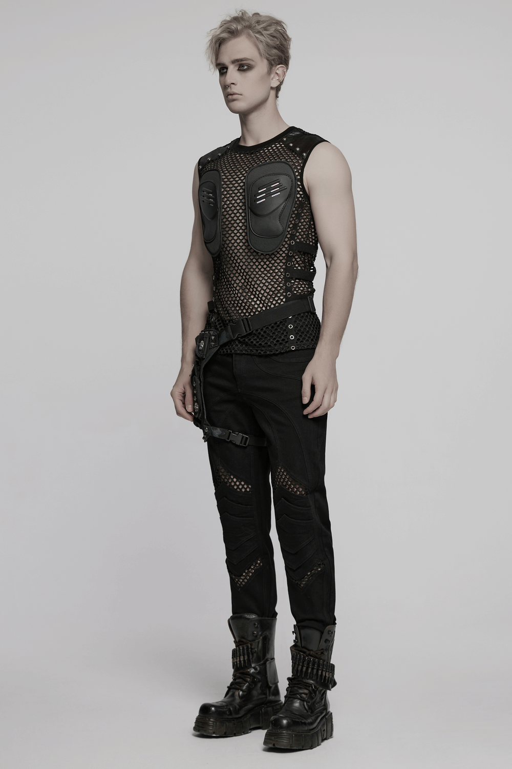 Stylish men's cyber punk mesh top featuring faux leather, studs, and a rugged patchwork design, perfect for edgy outfits.