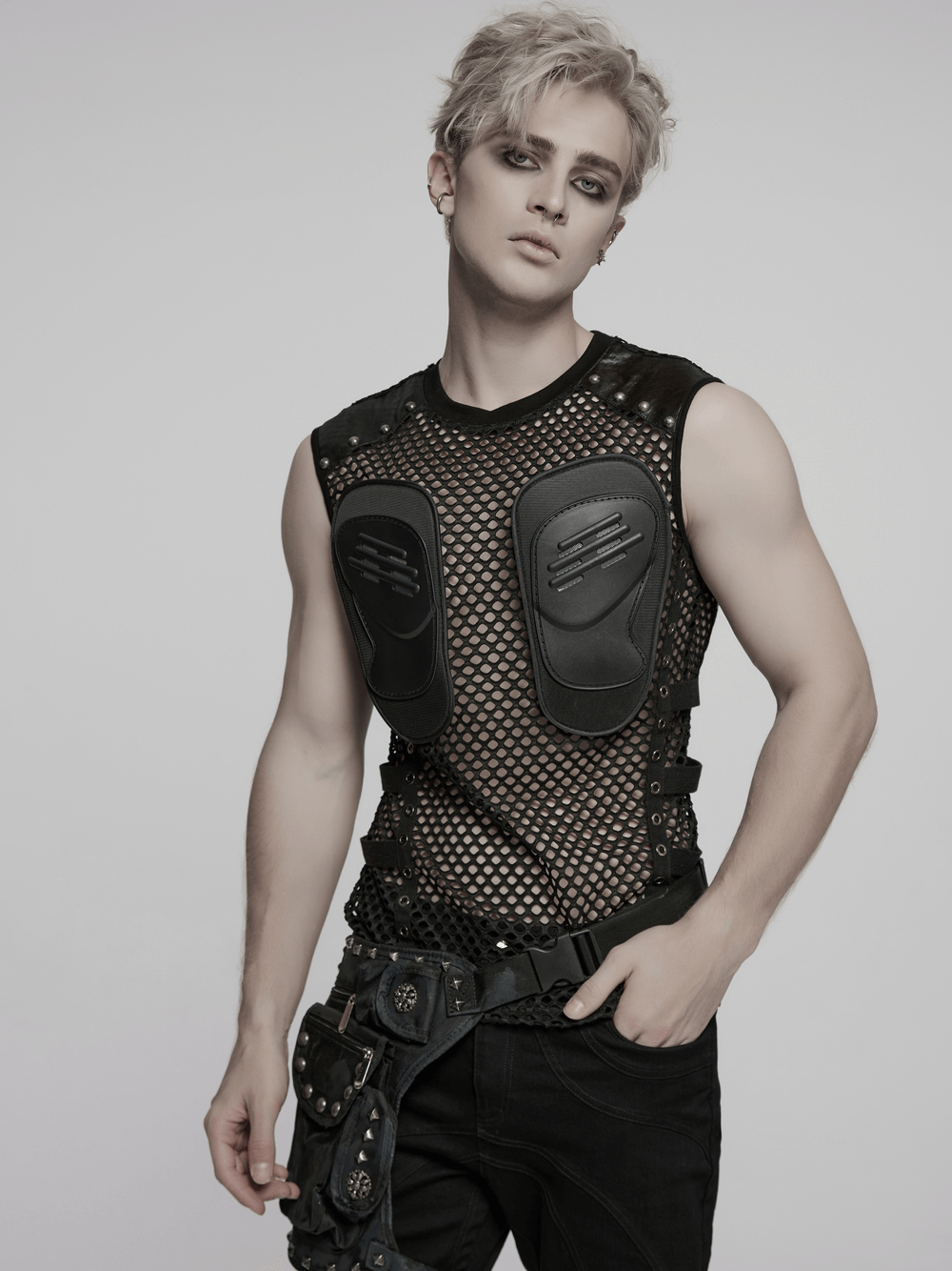 Men’s cyberpunk sleeveless mesh top with faux leather patches and studded details for edgy fashion.