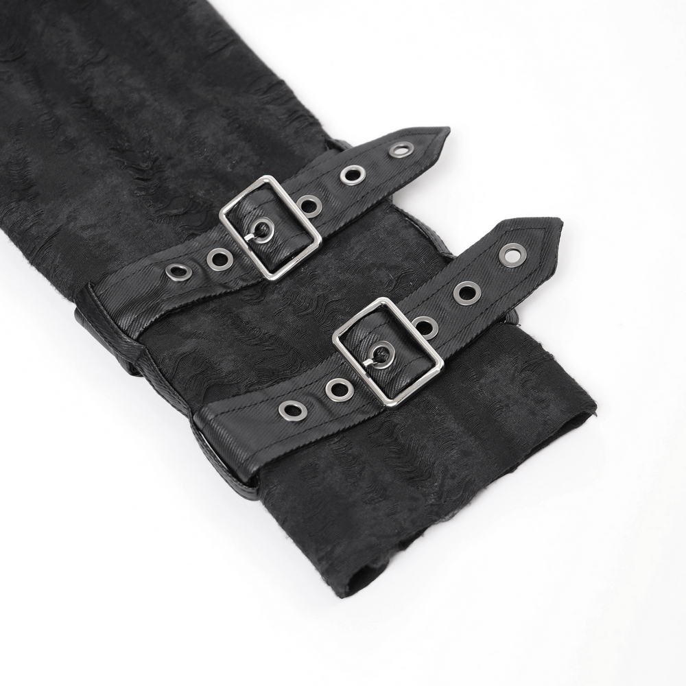 Close-up of black buckle straps on men’s gothic hooded coat, showcasing dark aesthetic and detailed design.