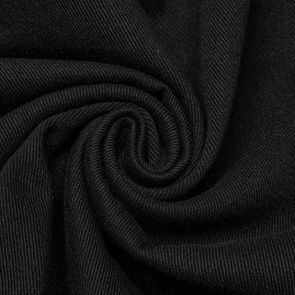 close-up of black woven fabric showcasing its soft, textured surface and rich, deep color, ideal for stylish clothing.