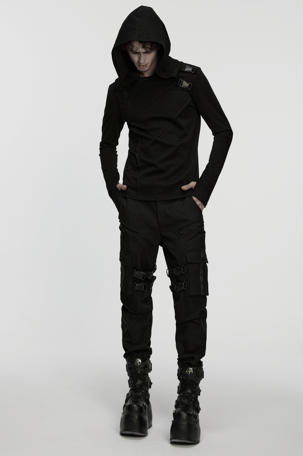 Men's Asymmetric Hoodie with Zipper and Buckle Details worn by a model in all black outfit, showcasing cyberpunk style.