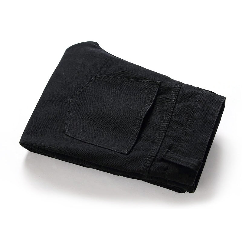 Folded black men's biker jeans with a pocket detail, stylish denim alternative for a classic look.