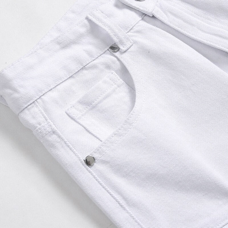 Close-up of white men's biker jeans showing pleats and denim texture, perfect for a stylish casual look.