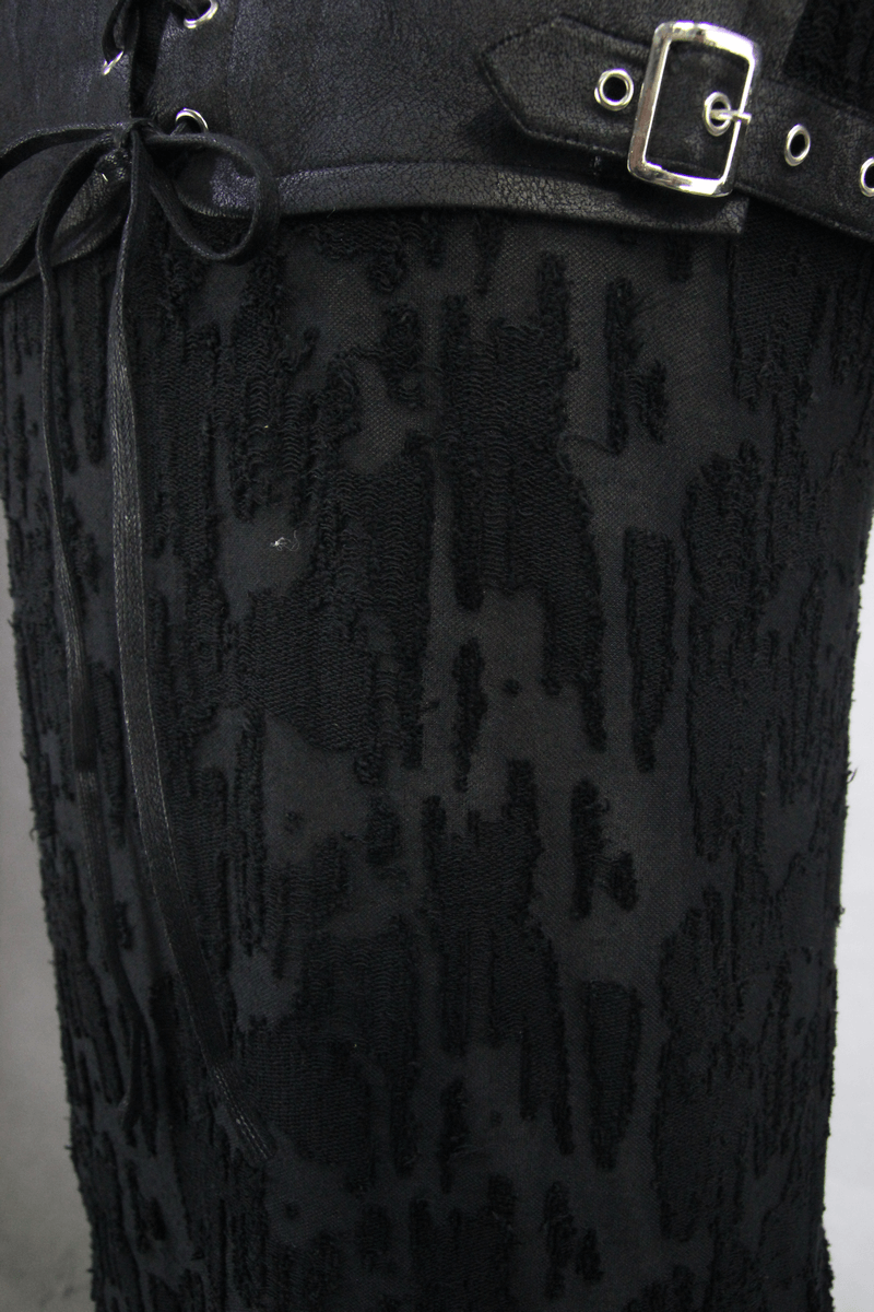 Close-up of black textured fabric with leather belt detail, ideal for gothic or alternative fashion enthusiasts.