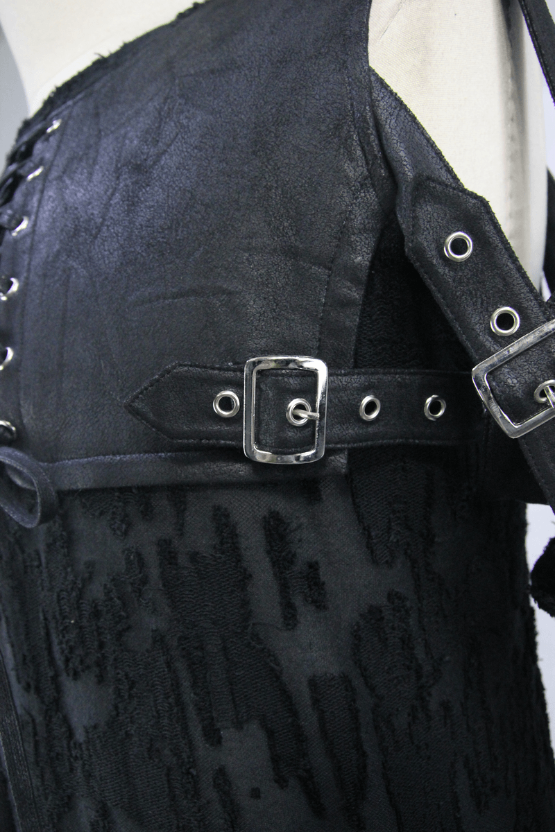 Close-up of men's black gothic top featuring detachable leather sleeves and stylish buckle detailing.