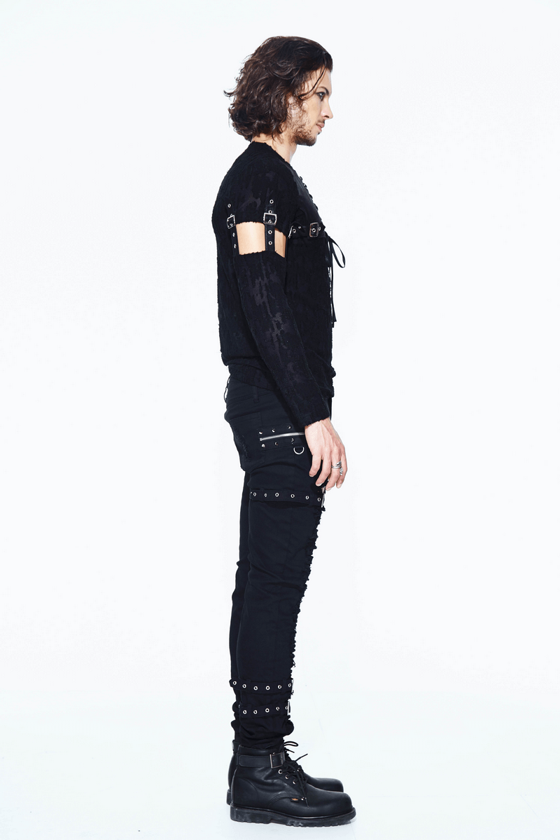 Model showcasing the men's black detachable sleeves top with gothic style and leather accents, paired with edgy black pants.