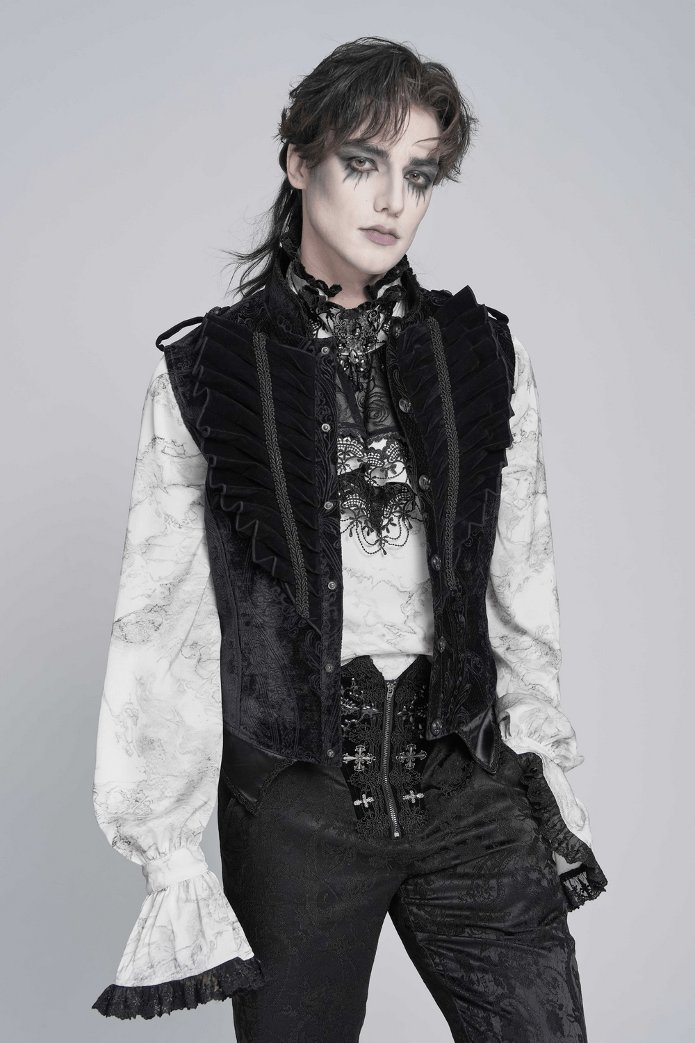 Men's Black Gothic Velvet Waistcoat with Buckles styled over a ruffled white shirt, showcasing Victorian elegance.