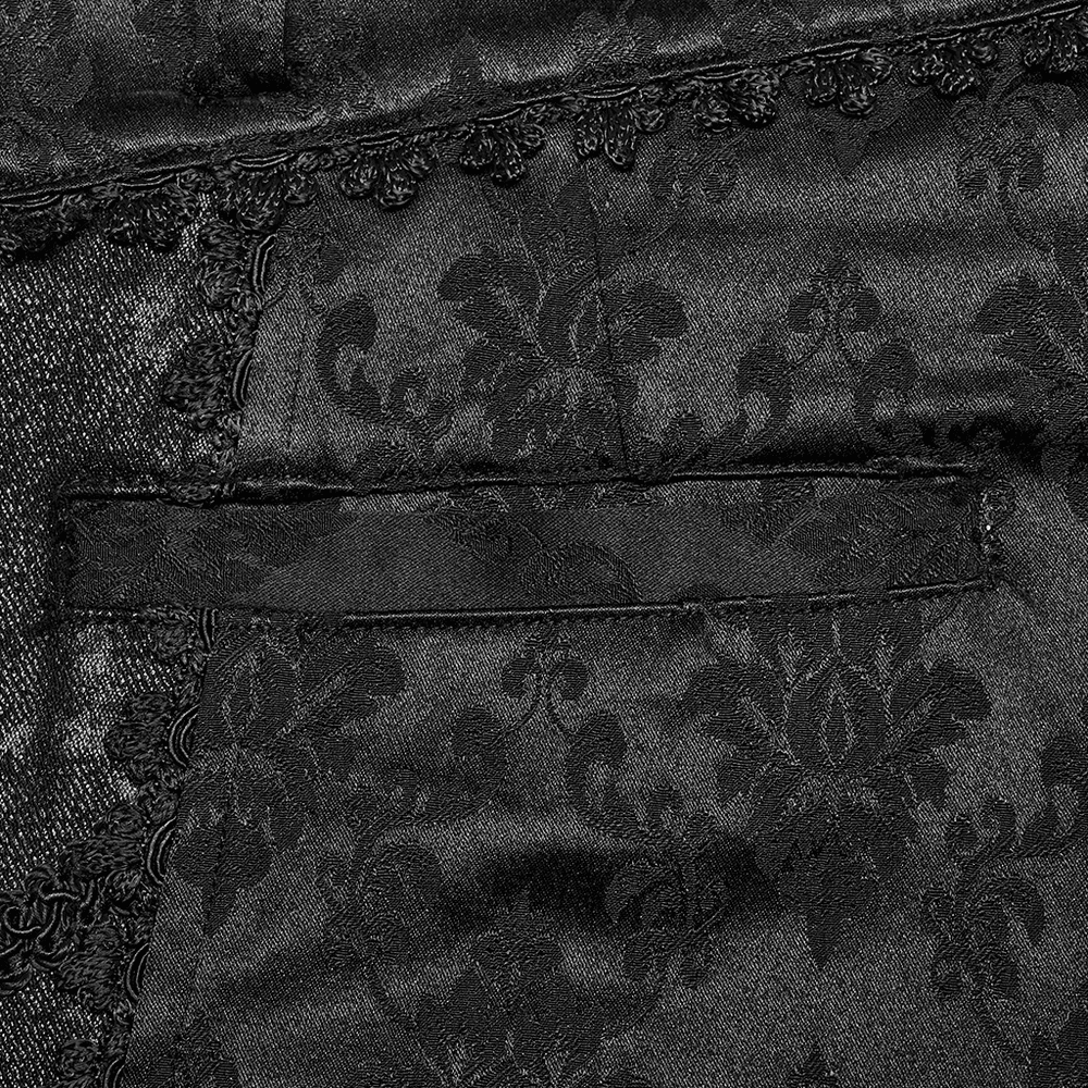 Close-up of black jacquard fabric with lace trim details, showcasing elegant gothic style design elements.