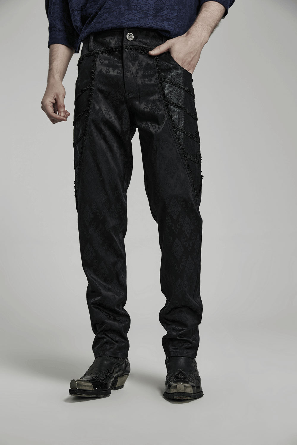 Men's black jacquard lace-trim designer pants showcasing gothic style and elegant detailing.