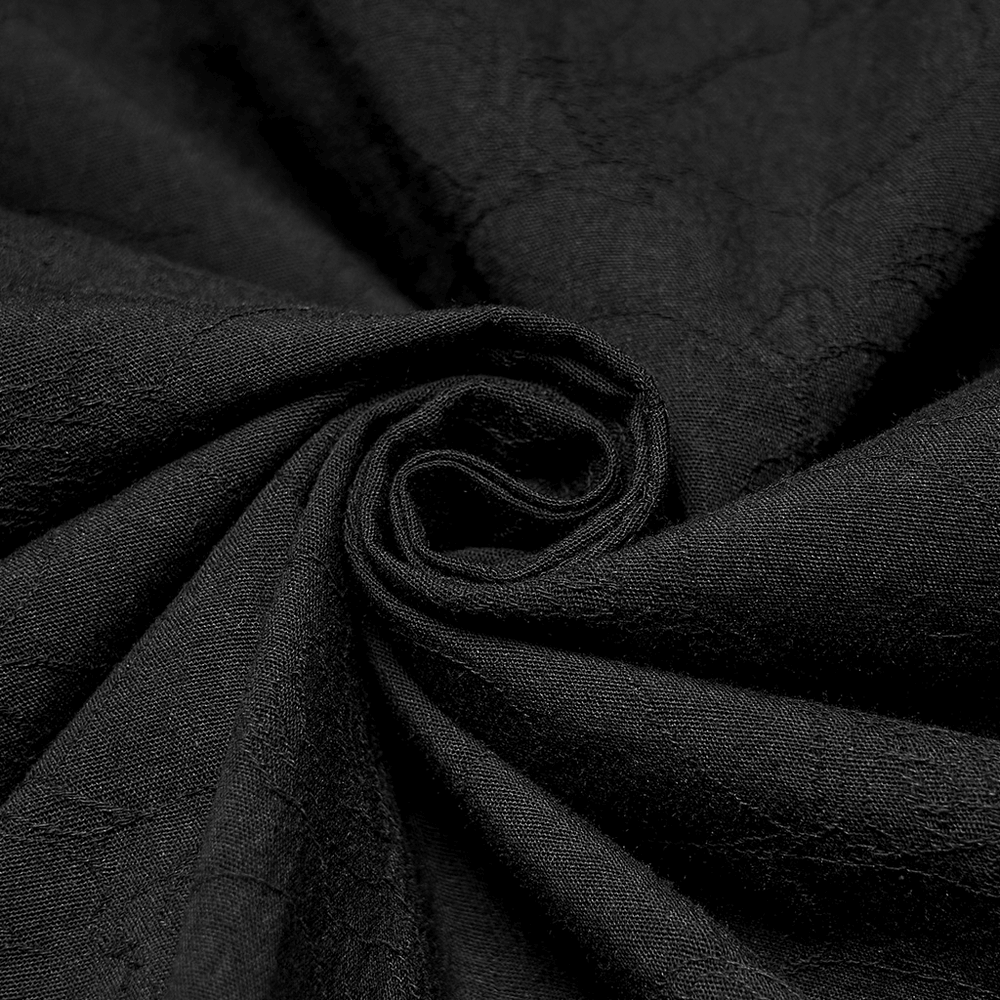 Men's Black Jacquard Long-Sleeved Shirt in Gothic Style black fabric close-up showing texture and richness.
