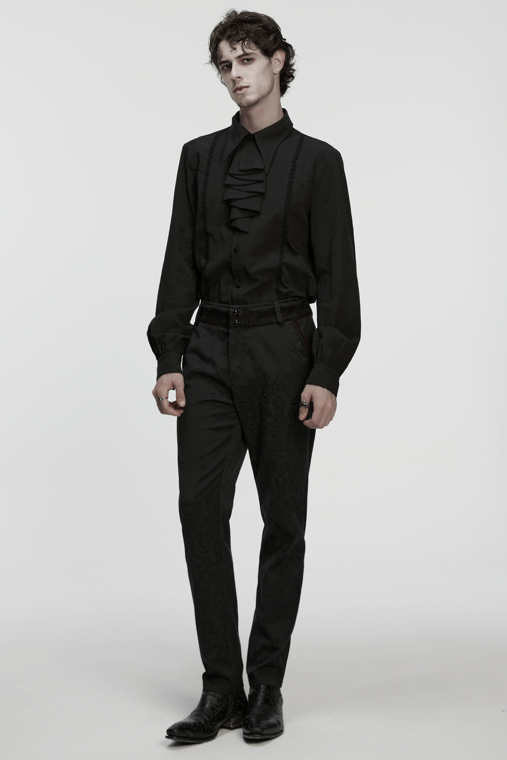 Men's Black Jacquard Long-Sleeved Shirt in Gothic Style modeled with a modern gothic outfit and sleek black trousers.