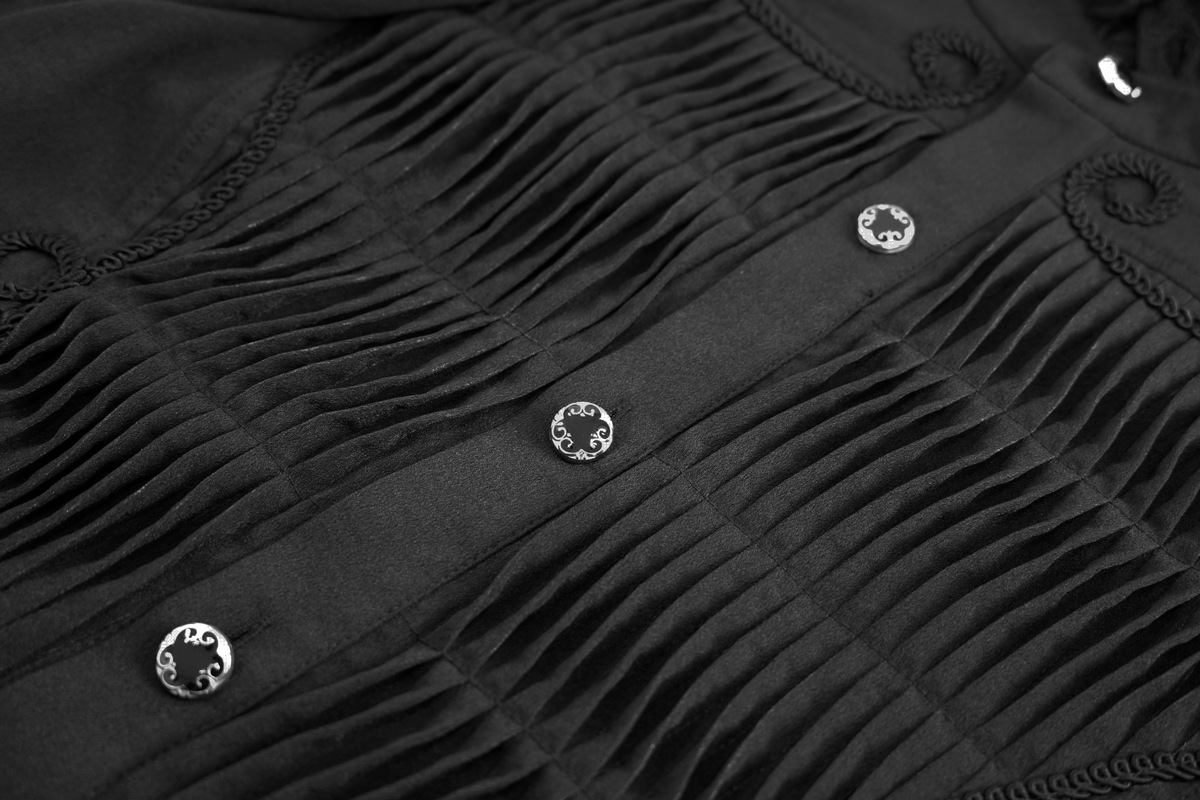 Close-up of a men's black gothic vintage shirt featuring intricate pleats and decorative buttons.