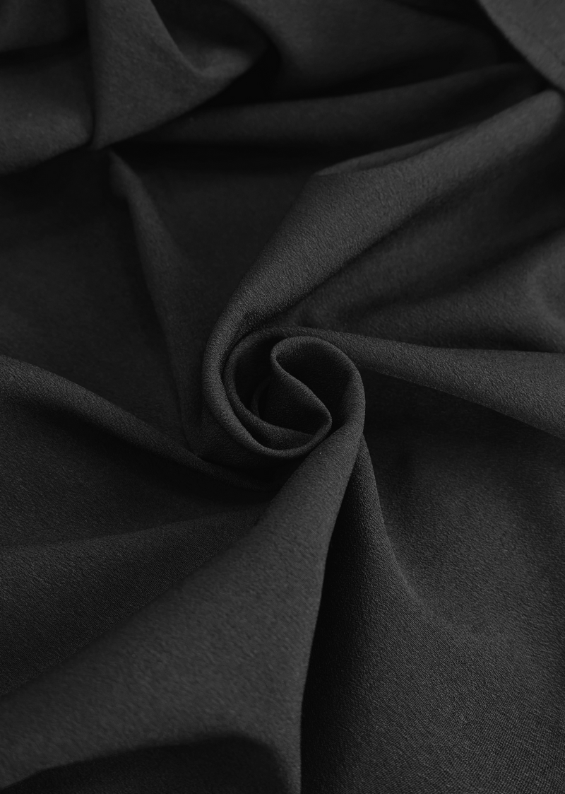 Soft black fabric showcasing the texture for a gothic style vintage men's shirt.
