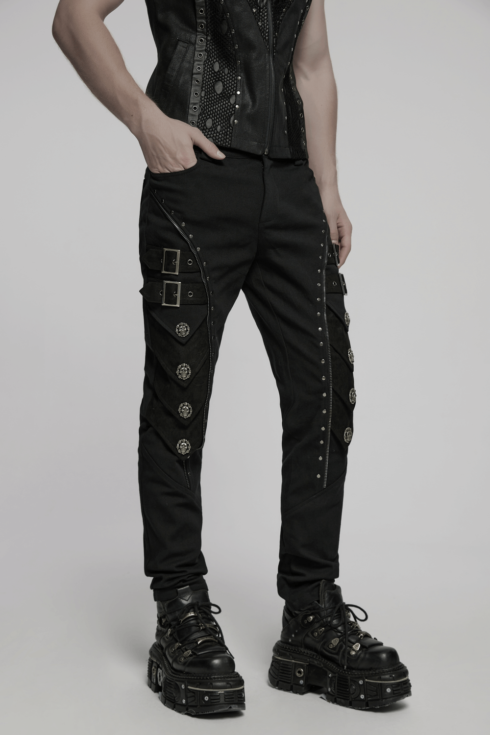 Men's gothic black pants with rivets and buckle straps for alternative streetwear.
