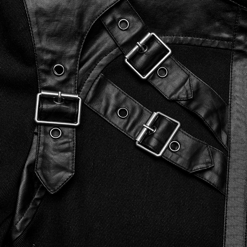 Close-up of men's black punk jacket featuring eyelet loops and metal buckles for a rebellious style.