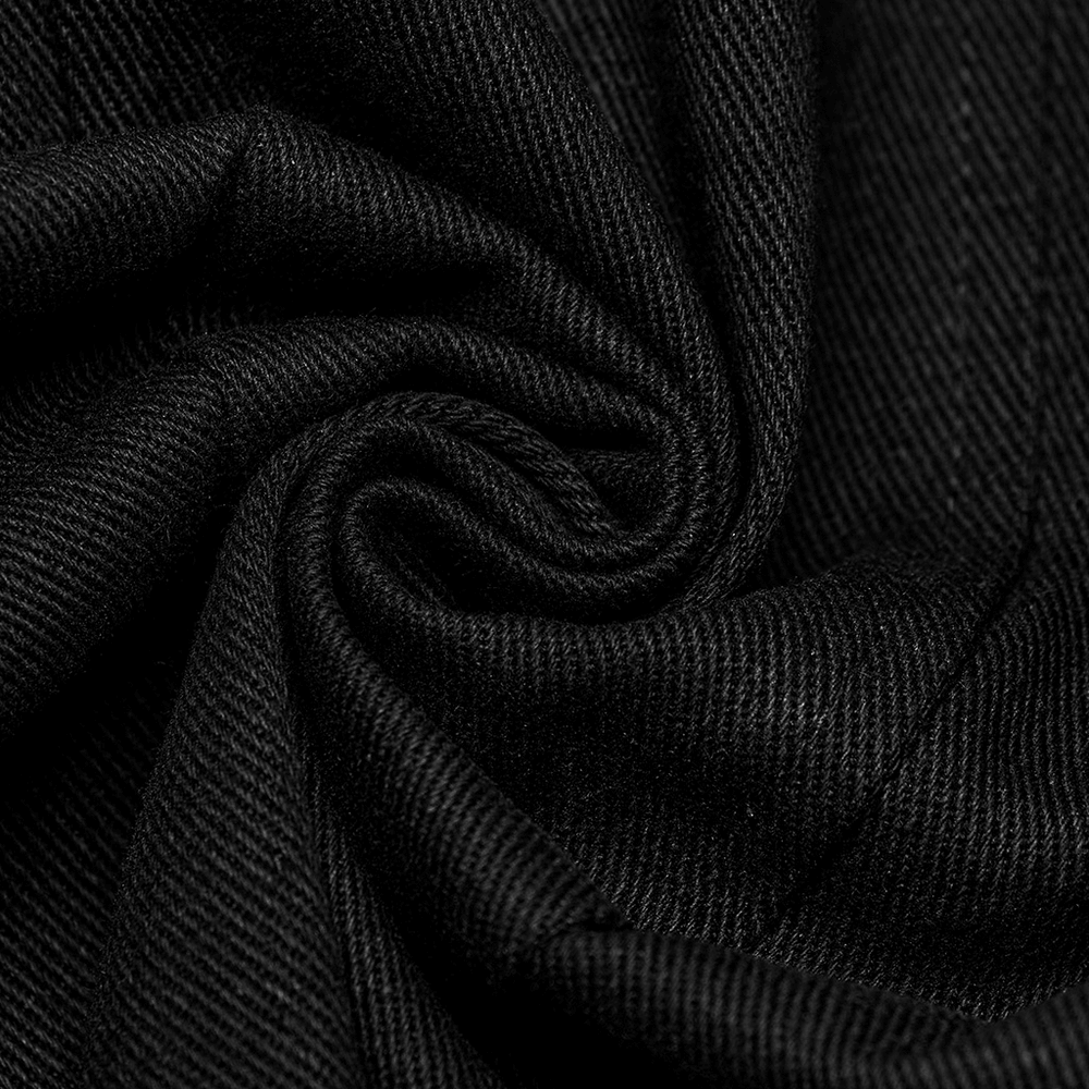Close-up of black twill fabric, showcasing its unique texture and sleek design, perfect for punk jackets.