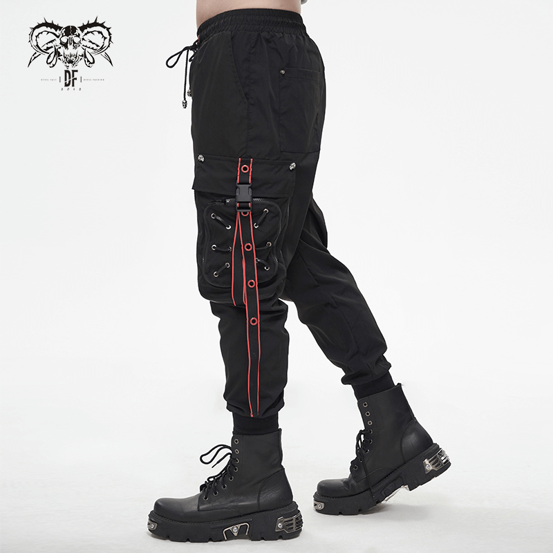 Men's punk style black cargo trousers with red accents and straps, perfect for a bold streetwear look.