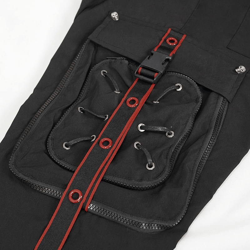 Close-up of men's black punk cargo trousers featuring red accents and detail on pockets.
