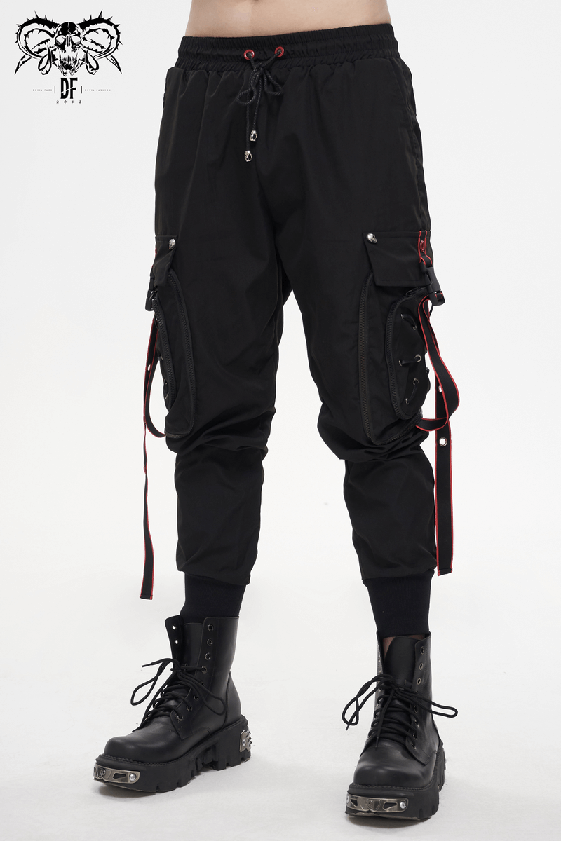 Men's black punk cargo trousers with red accents and straps, perfect for a stylish, edgy look.