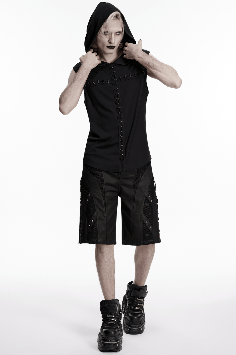 Men's Black Punk Mesh Panel Shorts with Studs worn by a model in a stylish pose.