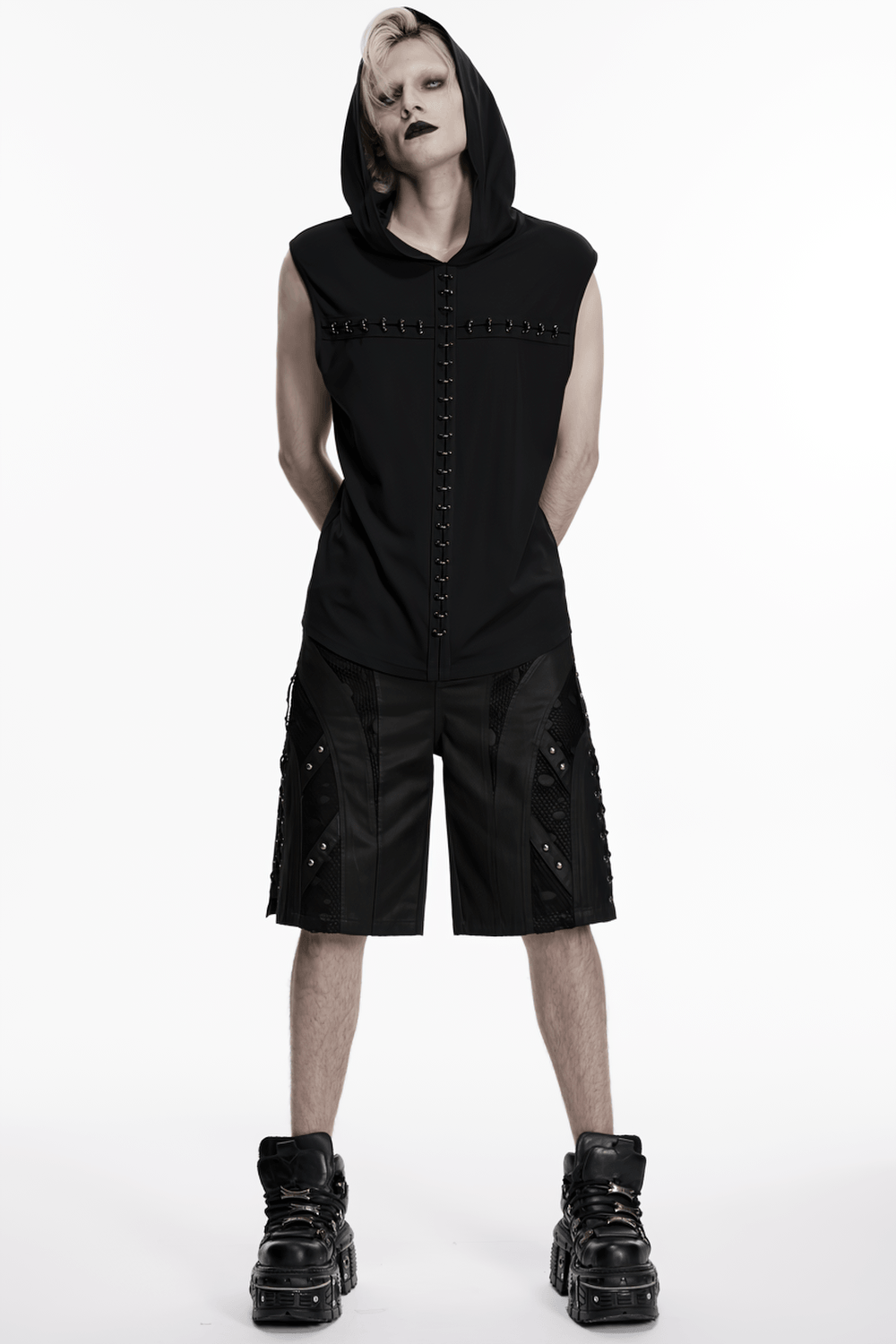 Men's Black Punk Mesh Panel Shorts with Studs worn by a model with a hood and chunky boots.