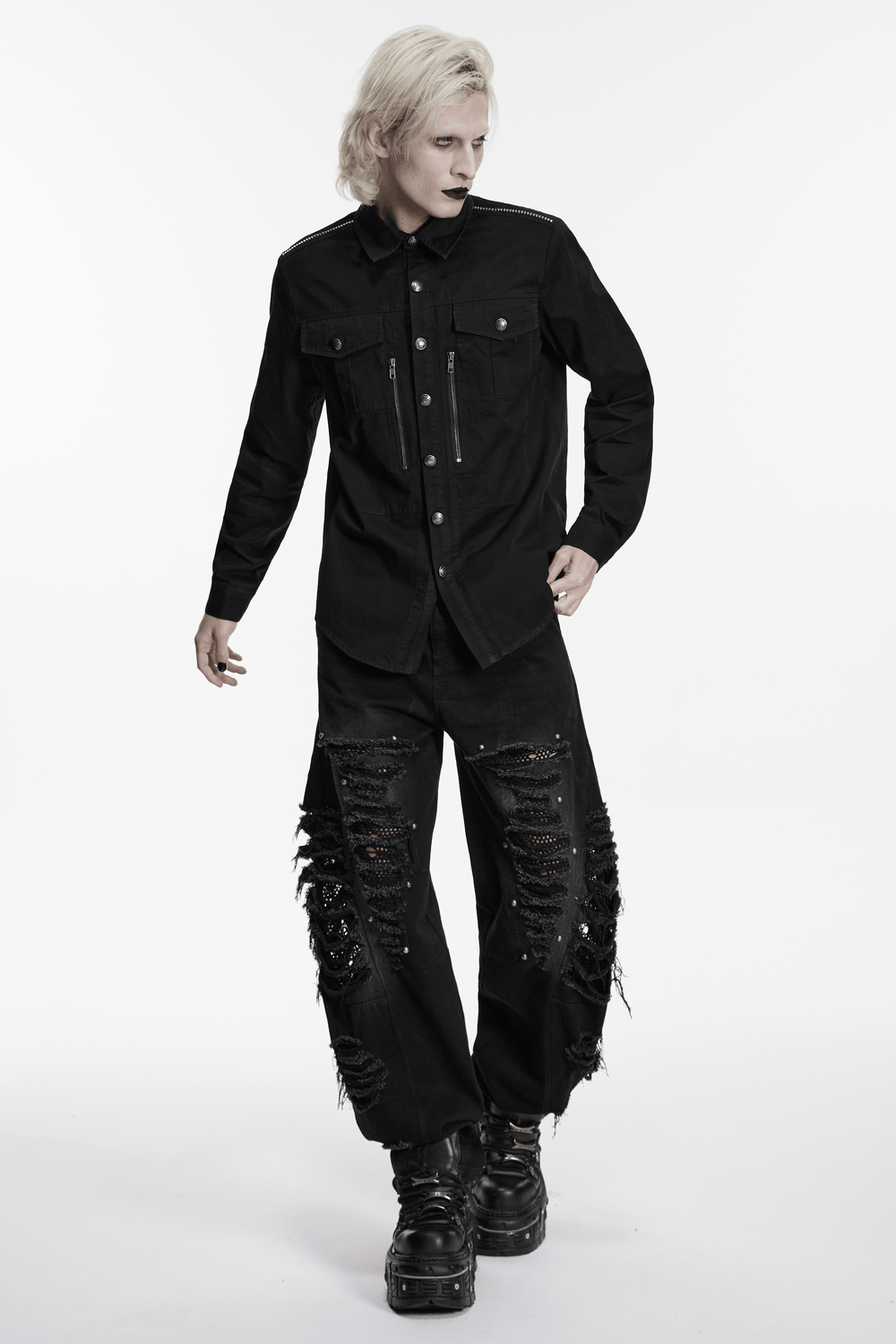 Men's Black Punk Workwear Shirt with Zip Pockets worn with distressed black pants and chunky boots.