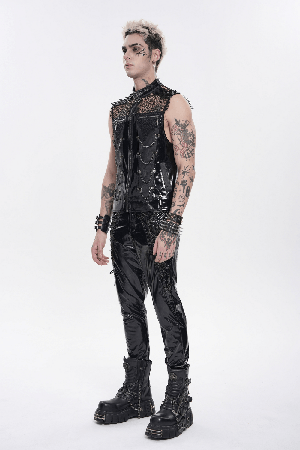 Men's Black PVC Punk Mesh Vest with Spikes and Chains, showcased with spiked shoulders and rugged black pants.