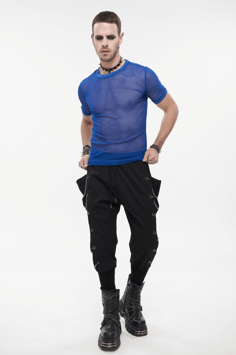 Stylish man wearing a blue mesh short-sleeve t-shirt with punk pants, showcasing alternative fashion trends.