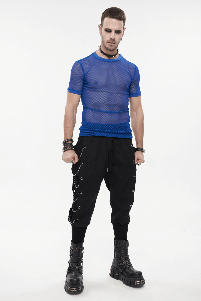 Model wearing a men's blue mesh O-neck t-shirt with short sleeves and punk style black pants, showcasing alternative fashion.